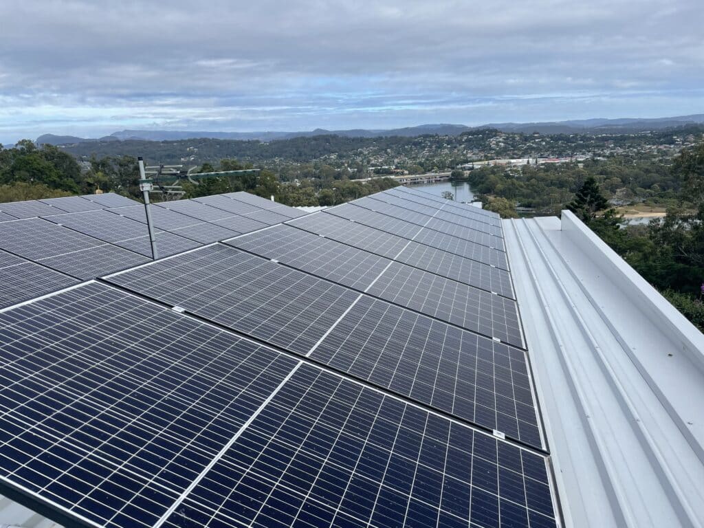 photo of a roof top with solar panel installed