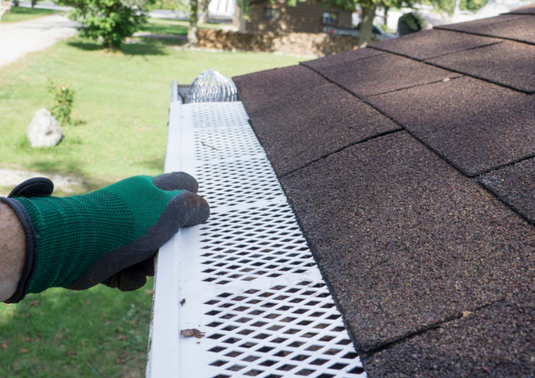 worker installing mesh guard