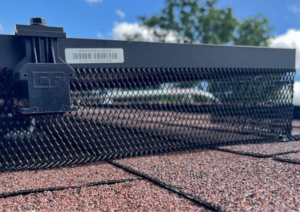 photo of a vent with gutter guard installed